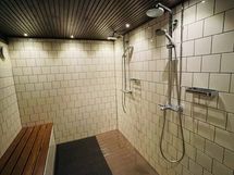 Taloyhtiön saunaosaston pesuhuone