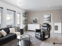 Olohuoneessa kuvan oikeassa nurkassa on varaus takalle.