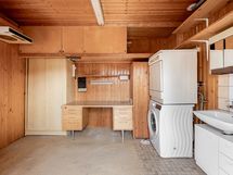 Talousrakennuksessa oleva kodinhoitohuone