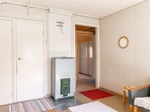 Yläkerran huone, jossa "porinmatti"