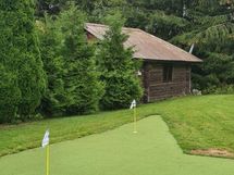 Myyjän kuva golfgreenistä.