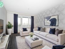 Digistailattu kuva olohuoneesta.