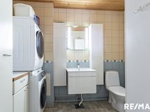 Alakerran wc/kodinhoitotila.
