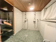 Taloyhtiön saunan pesuhuone