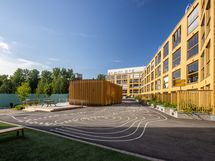 Taloyhtiön asukkaita hemmotellaan suojaisalla korttelipihalla.