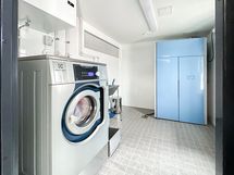 Asukkaiden käytössä on taloyhtiön pesutupa.