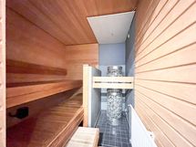 Taloyhtiön tyylikäs sauna