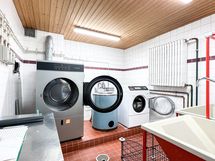 Taloyhtiön pesutupa.