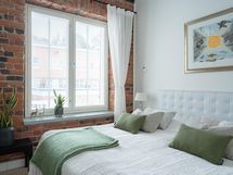 Tiili on tyylikkäästi mukana kaikissa huoneissa