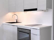 Keittiössä modernit kodinkoneet