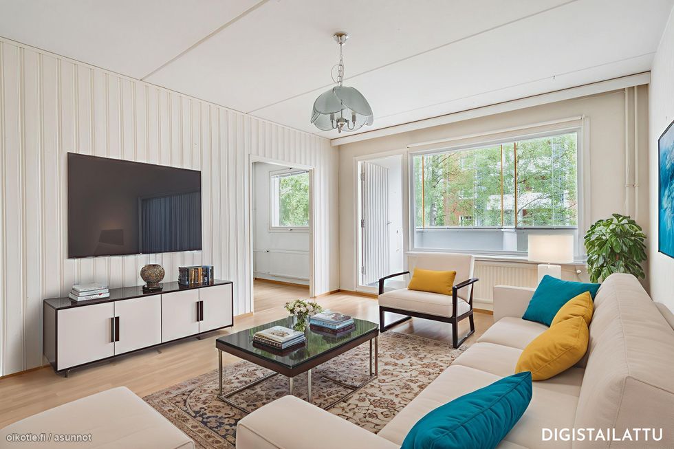 Olohuone on tilava ja valoisa