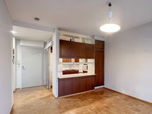 Keittokomero on osittain avoinna olohuoneen puolelle.