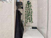 Paikka päältä täytettävälle pesukoneelle.