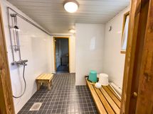 Taloyhtiön saunan pesuhuone