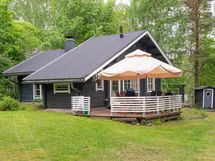 Honkarakenteen  hirsimökki