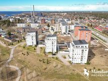 Ilmakuvaa, kauempana näkyy Toppilan Supermarket.