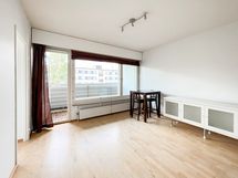 Huoneen jatkeena lasitettu parveke