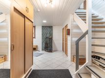 Sisääntuloaula/takkahuone