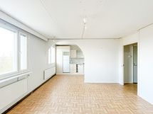 Keittiö asettuu olohuoneen viereen.