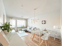 Olohuone on valoisa ja tilava.