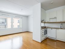 Tilava olohuoneen ja ruokailutilan yhdistelmä on tämän asunnon keskipiste.