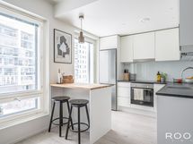 Käytännöllinen saareke tuo keittiöön tarpeellista lisätilaa.