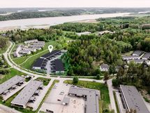 Ilmakuvaluonnos Raadelman Iriksestä. Yhtiö sijaitsee Hartmanintie varressa.