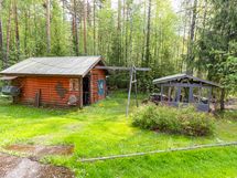 Puuvaja ja grillikatos