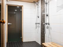 Taloyhtiön saunan pesuhuone