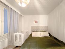 Toinen makuuhuone on niinikään tilava.