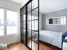 Makuuhuone olohuoneen sivussa