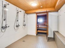 Taloyhtiön saunaosaston pesuhuone