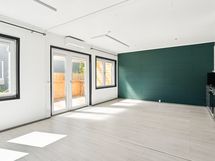 Näkymä olohuoneesta keittiön suuntaan