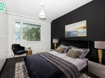 Digistailattu kuva makuuhuoneesta.