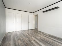 Keittiön takana oleva makuuhuone