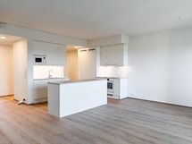 Moderni, toimiva ja tyylikäs avokeittiö