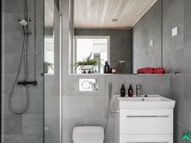 Kylpyhuone ja sauna sisääntulokerroksessa