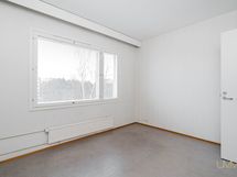 Pienempi makuuhuone.