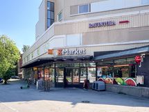 K‑Market Reimarla sijaitsee viereisessä rakennuksessa.