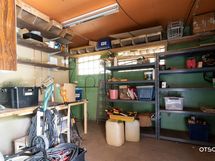 Autotallia/nikkarointitilaa