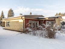 Suojainen takaterassi