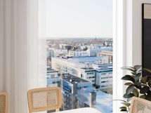 Isoista ikkunoista tulvii valoa.