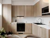 Keittiössä runsaasti kaappitilaa.