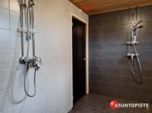 Taloyhtiön saunan pesuhuone