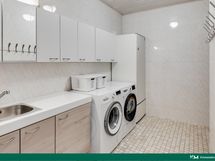 Pesuhuoneen yhteydessä kodinhoitotila