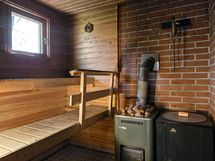 Puusauna, jossa vesipata