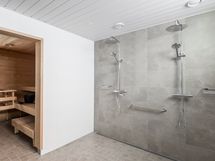 Taloyhtiön piha-sauna.
