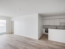 Keittiö sijoittuu asunnossa nurkkaukseen, joka mahdollistaa suuren ruokapyödän sijoittamisen asuntoon.