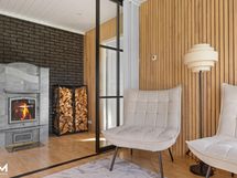 Takka-aula, jossa näkyy varaava takkauuni.