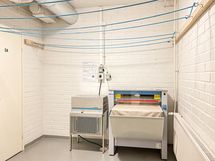 Taloyhtiön kuivaushuone.